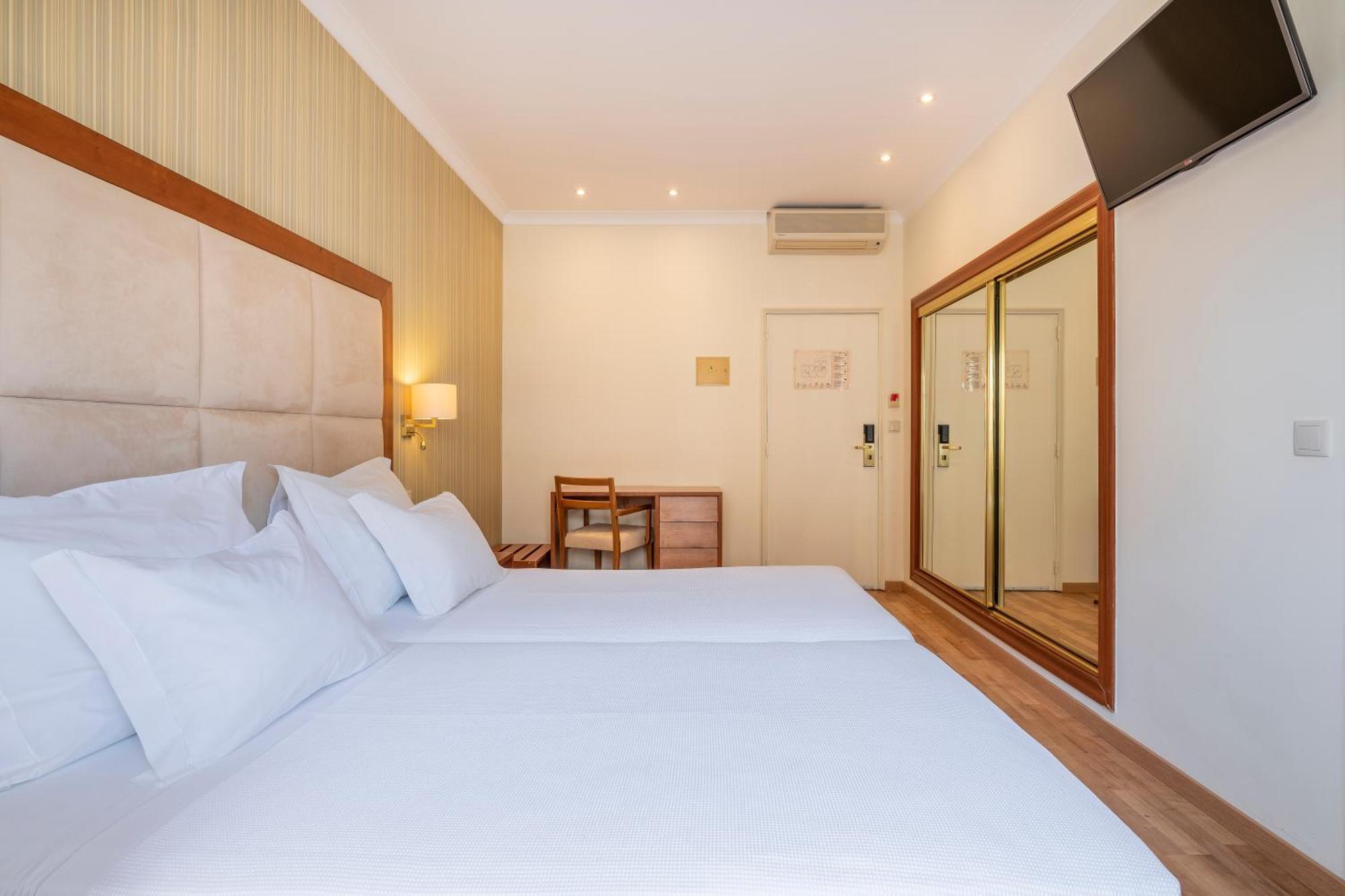 Hotel Baía de Monte Gordo Quarto foto